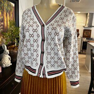 chic happens Cardigan red&brown striped trim w/ brown geometric design'